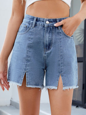 Light blue denim shorts with split front and frayed hem