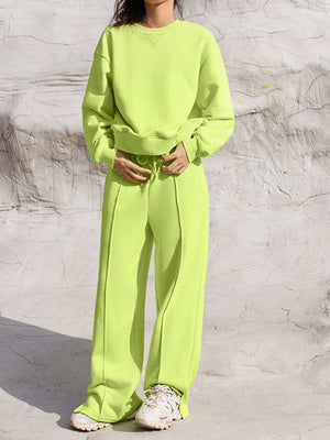 Lime seamed sweatshirt and wide-leg lounge pants set with drawstring waist.