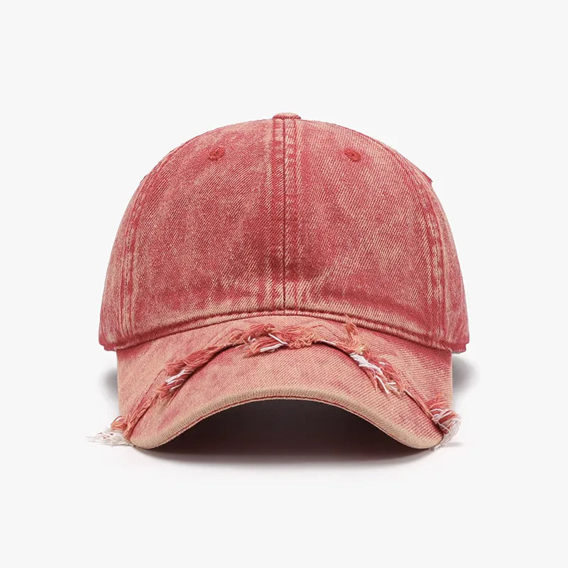 Acid wash distressed baseball cap in strawberry with frayed brim detail.