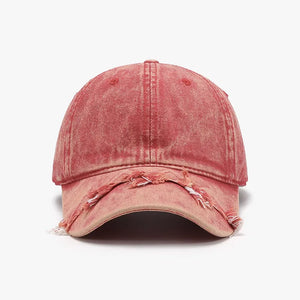 Acid wash distressed baseball cap in strawberry with frayed brim detail.