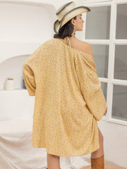 Yellow floral print kimono cover-up with off-the-shoulder design and tie detail.