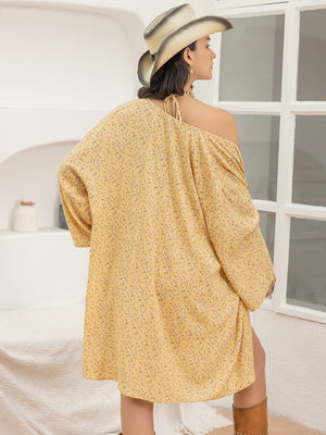 Yellow floral print kimono cover-up with off-the-shoulder design and tie detail.