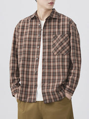 Brown plaid long sleeve button-down shirt with chest pocket