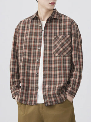 Brown plaid long sleeve button-down shirt with chest pocket