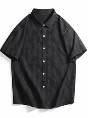 Black cotton button-up shirt with abstract pattern