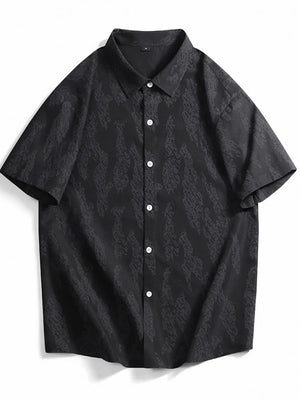 Black cotton button-up shirt with abstract pattern
