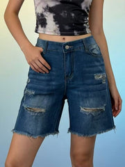 Distressed dark blue denim shorts with frayed hem and ripped details.
