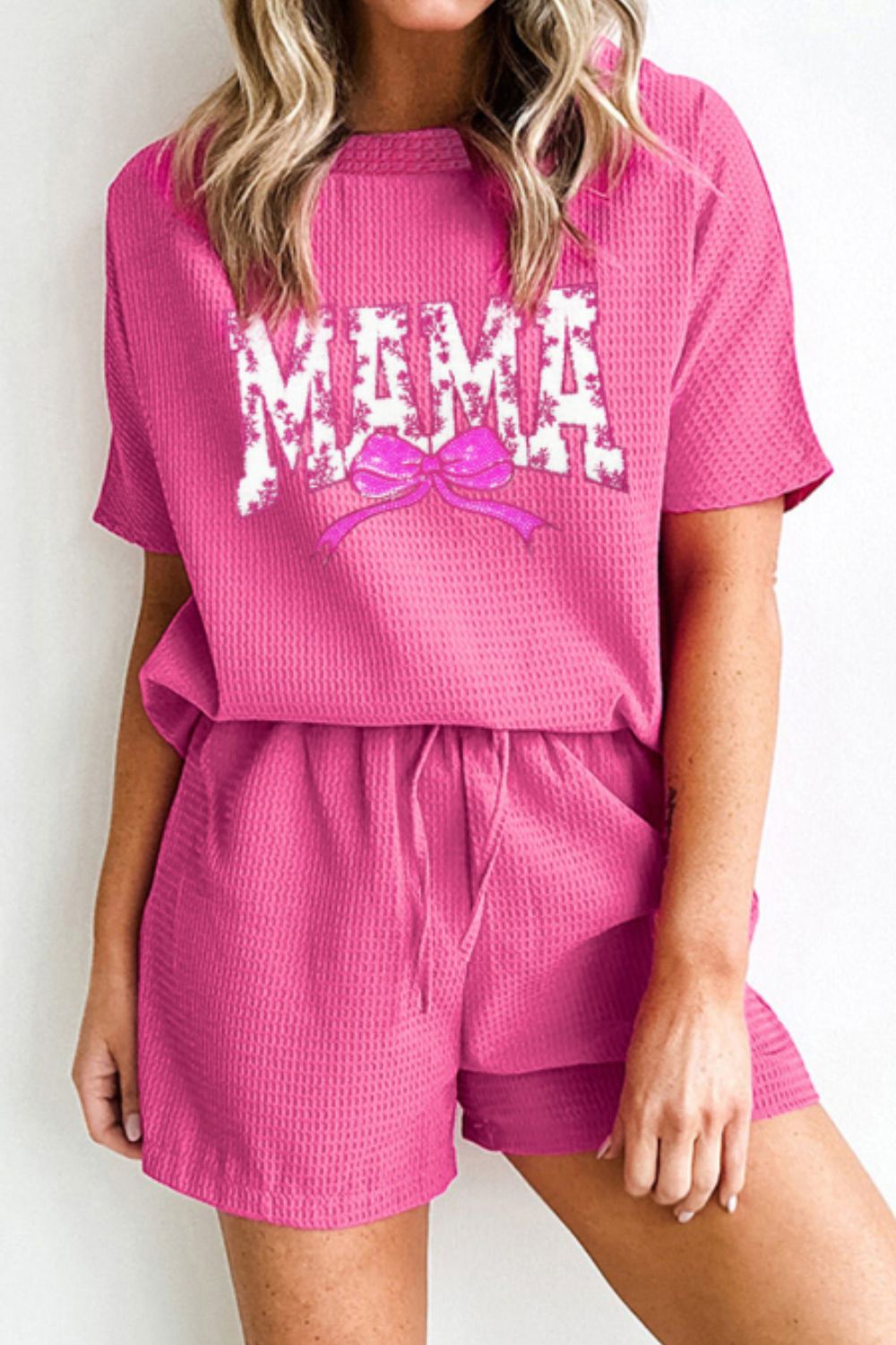 Fuchsia pink waffle knit loungewear set with MAMA graphic and bow detail.