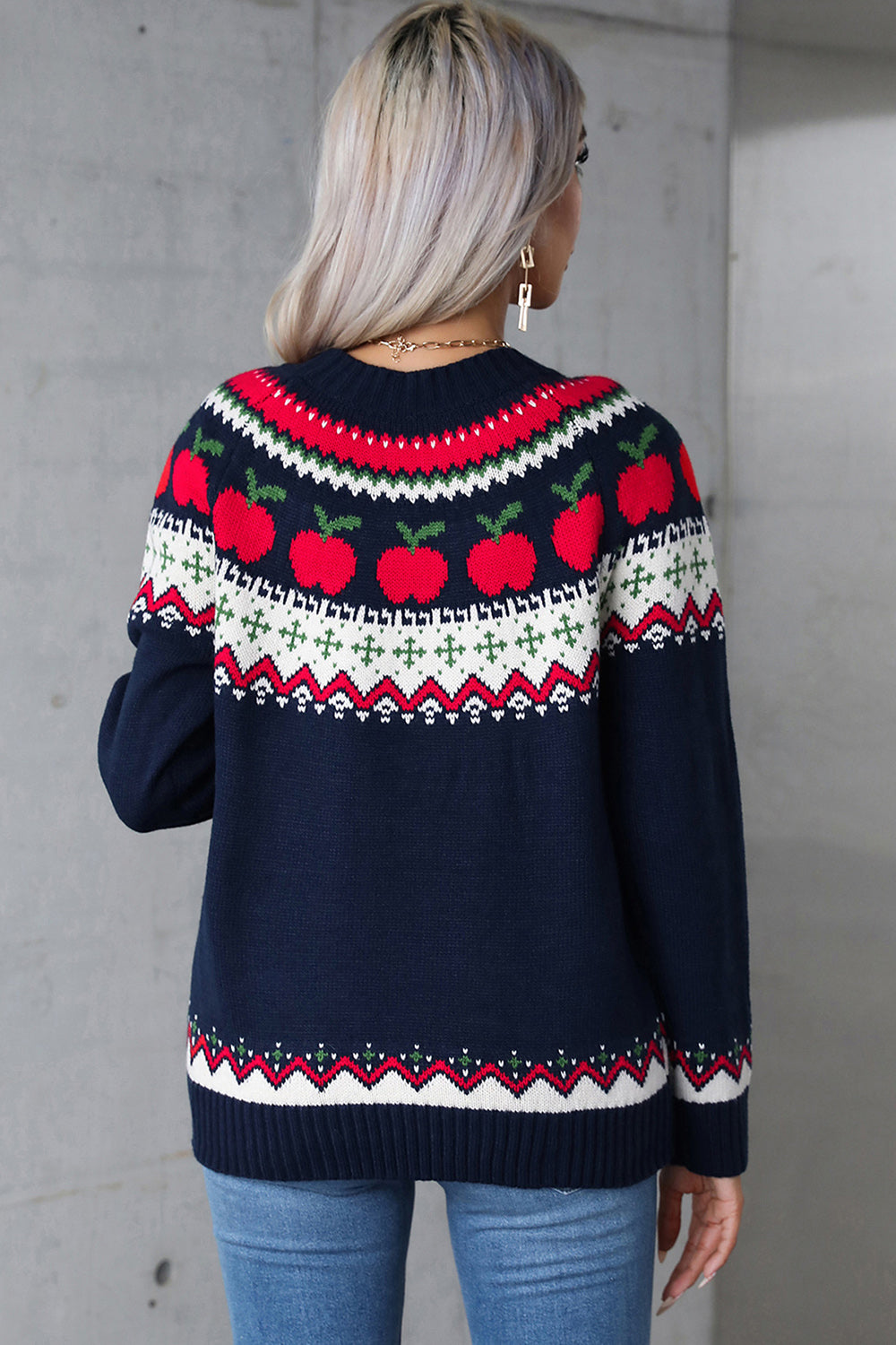 Dark blue acrylic sweater with festive Fair Isle apple motif and crewneck.