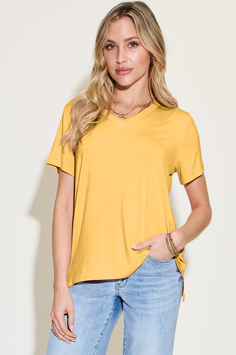 Yellow bamboo t-shirt with V-neck and asymmetric hemline