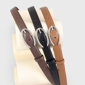 Leather belts in black, brown, and coffee brown with oval silver buckles.