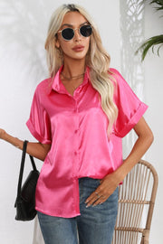 Hot Pink satin cuffed sleeve button-down blouse with a relaxed fit.