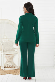 Emerald green flare leg pant suit with a classic blazer and wide leg pants.