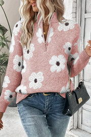 Blush pink floral intarsia mock neck sweater with quarter zip and fuzzy texture.