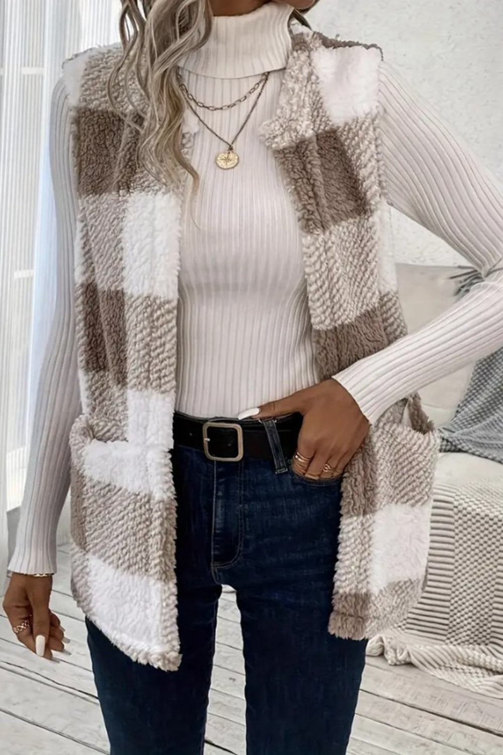 Oversized sherpa gilet in tan and white buffalo check with pockets.