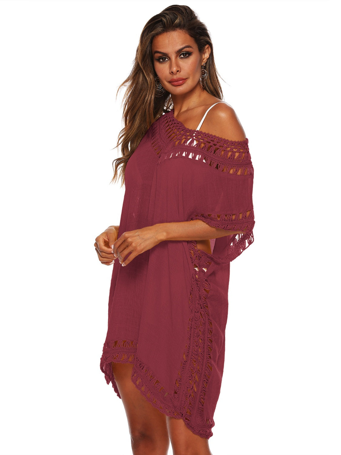Burgundy kaftan cover-up with crochet trim and fringe detail, off-the-shoulder neckline.