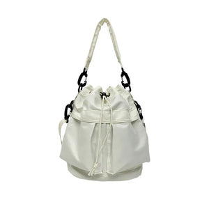 White nylon drawstring bucket bag with chain detail and carabiner clips