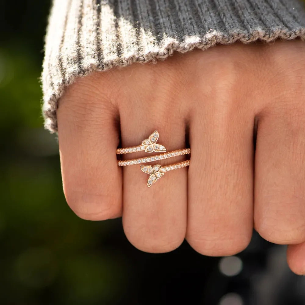 Gold bypass ring with two diamond-accented butterflies, 18K gold-plated