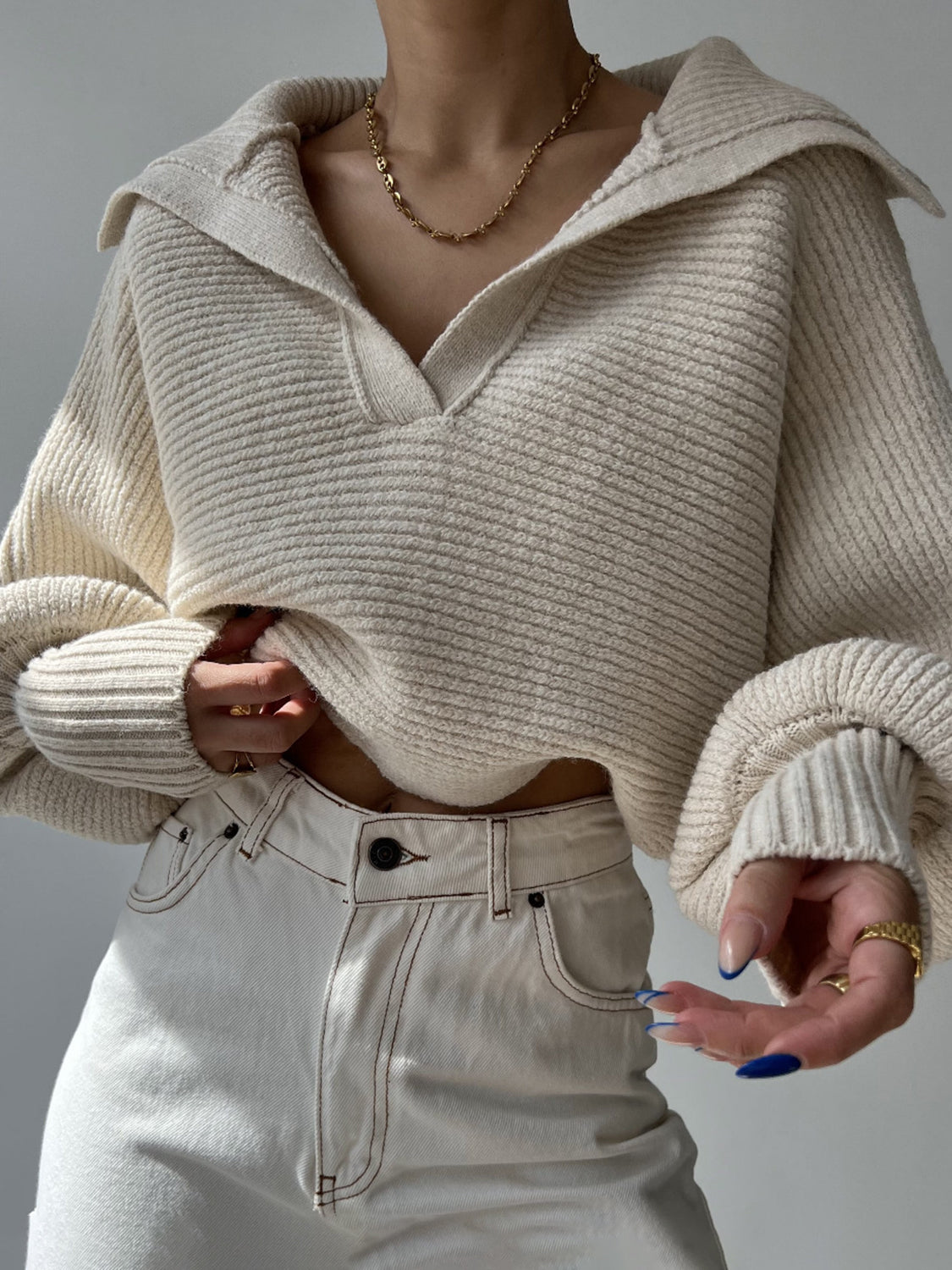 Wide collar balloon sleeve knit sweater in white, featuring a relaxed fit and textured knit.