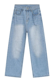 Faded light blue denim baggy jeans with a casual, relaxed fit.