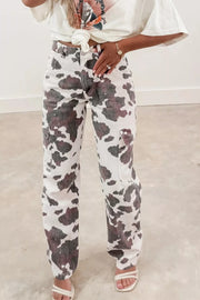 Cow print utility jeans with cargo pockets, made of cotton blend.