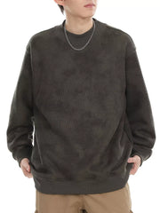 Dark gray oversized corduroy sweatshirt with mock neck and ribbed cuffs and hem.