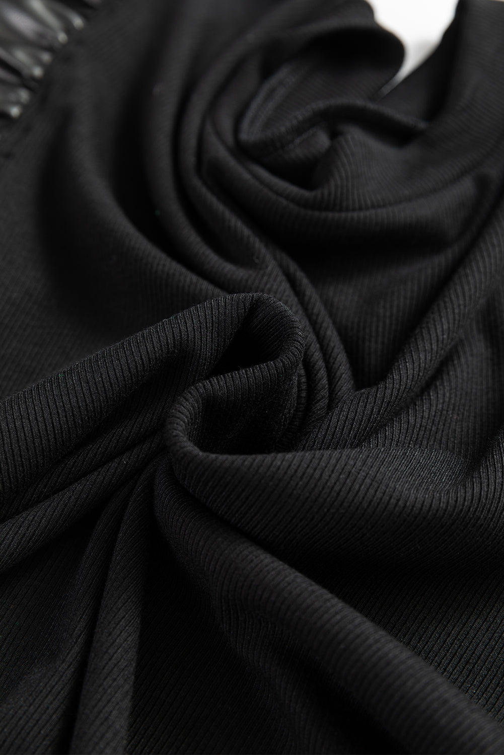 Black ribbed knit blouse with ruffled faux leather sleeve detail