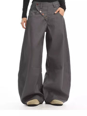 Gray relaxed fit button-fly wide-leg chinos with decorative buttons and pockets.