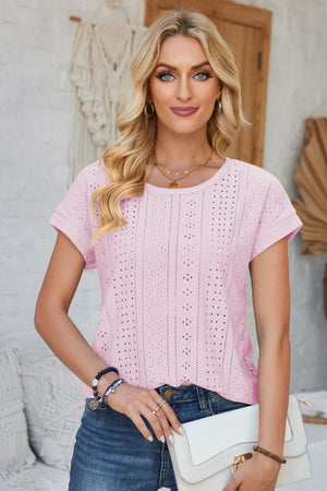 Perforated eyelet tee in blush pink with cuffed short sleeves and a crew neckline.