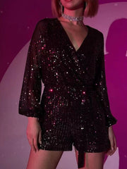 Black sequin wrap romper with blouson sleeves and tie waist