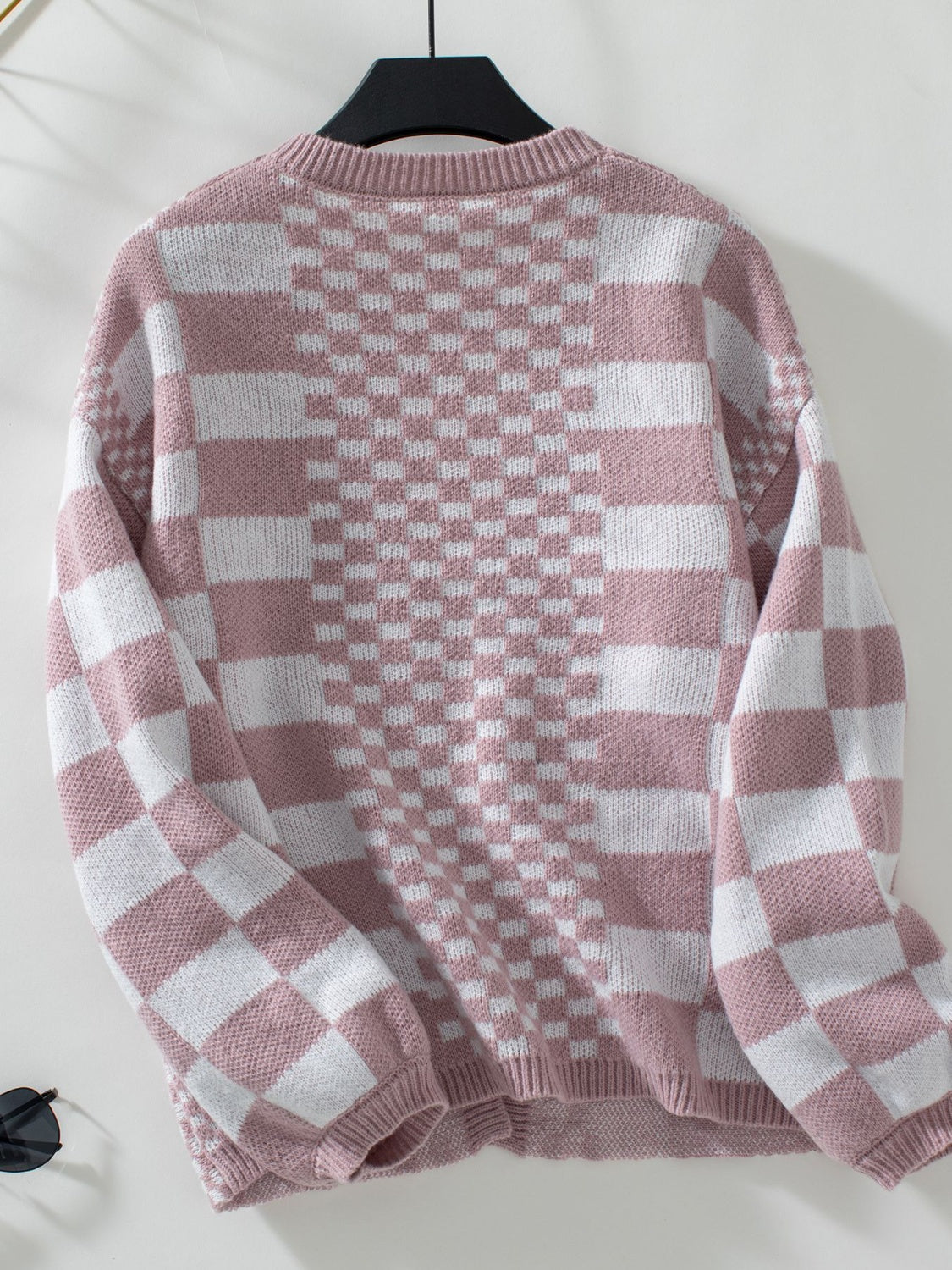 Dusty Pink checkerboard knit open-front cardigan with crew neck and long sleeves.
