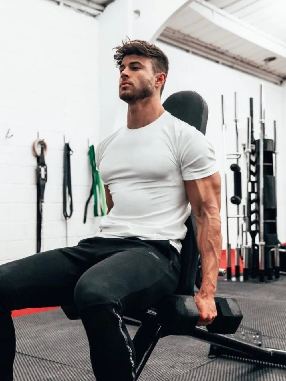 White performance fit raglan sleeve tee with crew neck and short sleeves.