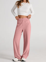 Button-front palazzo trousers in pale blush with utility pockets and a wide leg.
