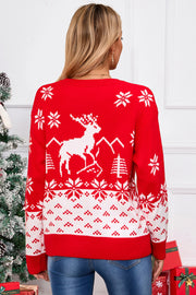 Red acrylic knit sweater with white reindeer, snowflake, and mountain Fair Isle pattern.