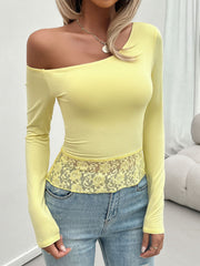 Light yellow off-shoulder blouse with lace trim detail