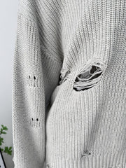 Light gray distressed cotton sweater with deconstructed details and ripped accents.
