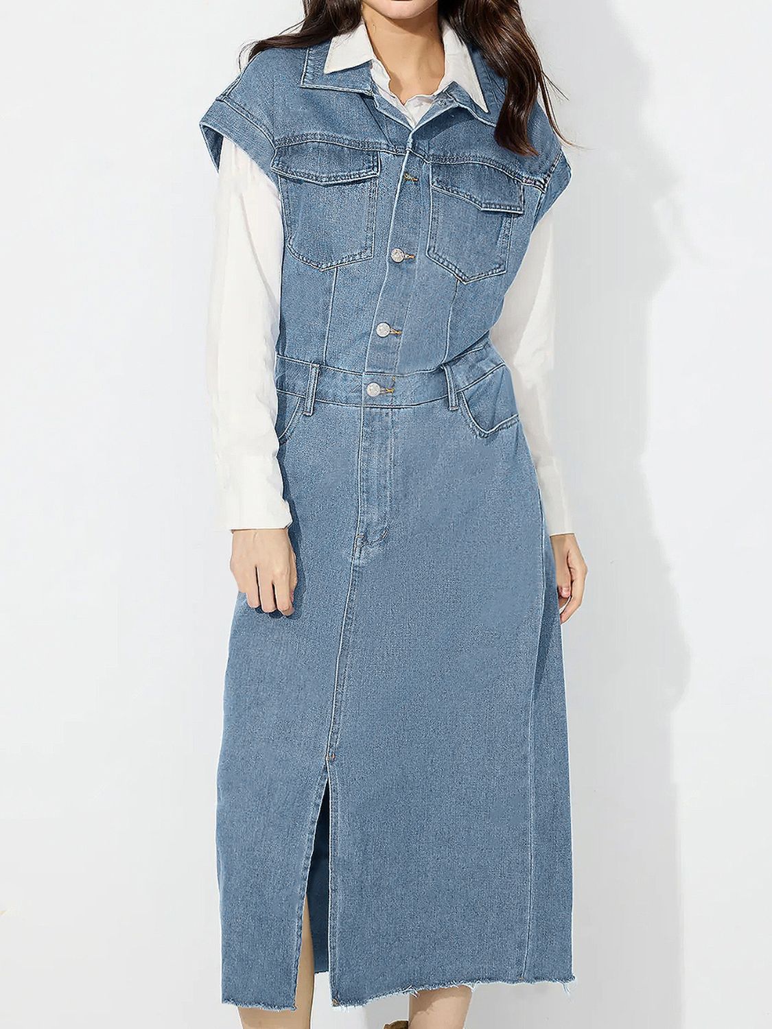 Sleeveless denim midi dress in light wash with button front, collar, and front slit