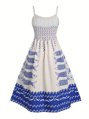 Spaghetti strap midi dress in cream with blue sardine print and floral border.