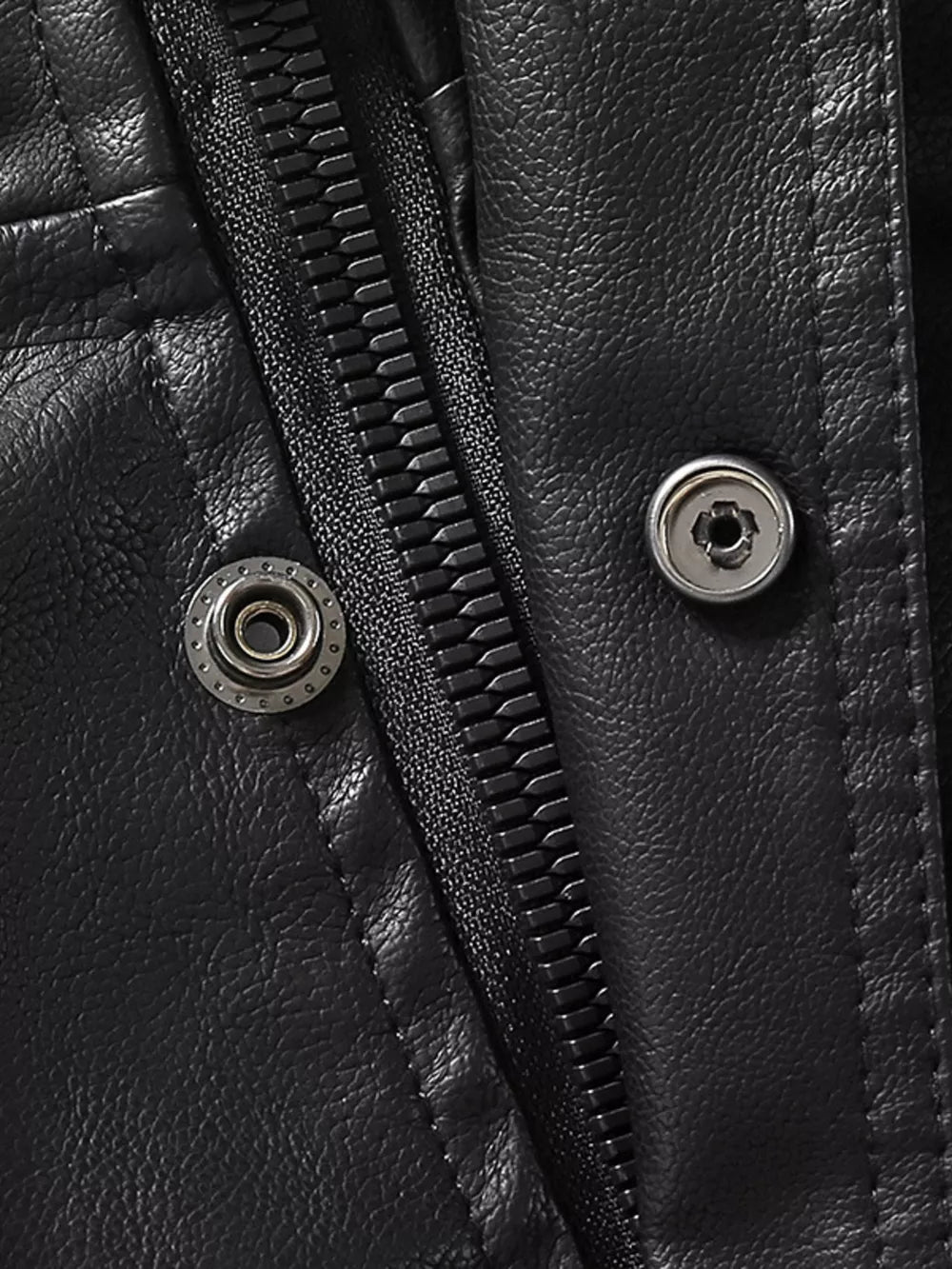 Black faux leather jacket detail with zip and snap buttons
