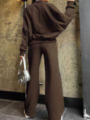 Sporty chic zip-up coord set in coffee brown, featuring a relaxed fit sweatshirt and wide-leg pants.