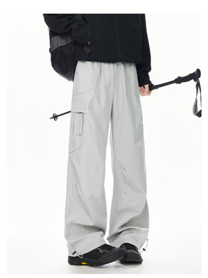 Men's light gray relaxed fit cargo sweatpants with adjustable drawstring ankles.