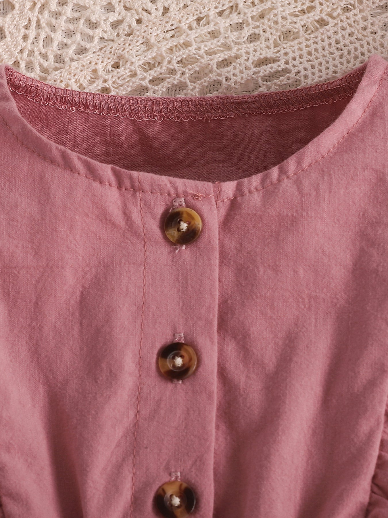 Pink baby set with button front and ruffle trim detail