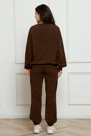 Chocolate corduroy loungewear set with crew neck sweatshirt and drawstring pants.