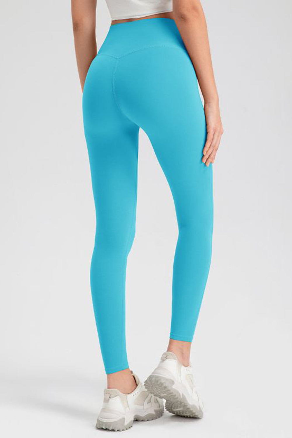 Light Blue high-waist leggings with V-seam detail, full length, athletic fit.