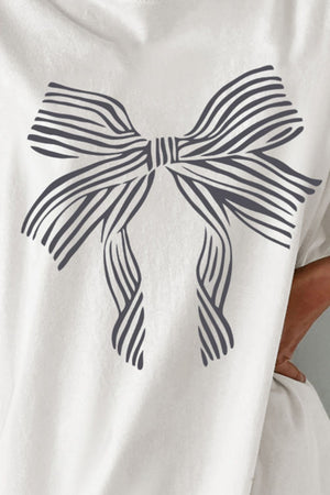 White oversized tee with a dark grey striped bow graphic.