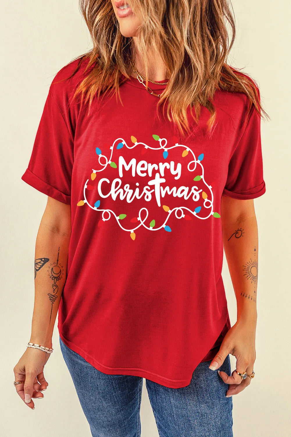 Red round neck t-shirt with Merry Christmas lights graphic.