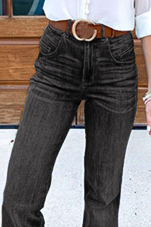 Black denim bell bottom jeans with a high waist and button closure