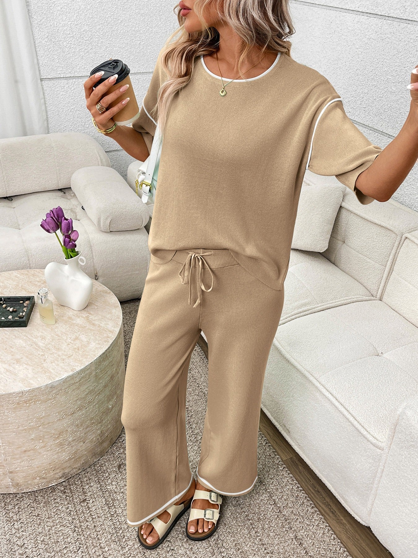 Khaki loungewear set with crew neck top and drawstring pants, featuring white piping details.