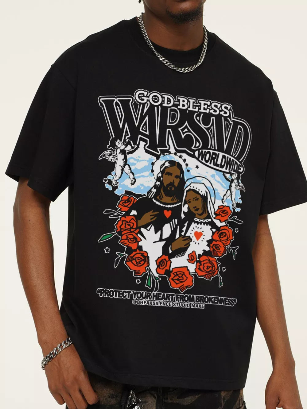 Black cotton graphic t-shirt with religious imagery and roses.
