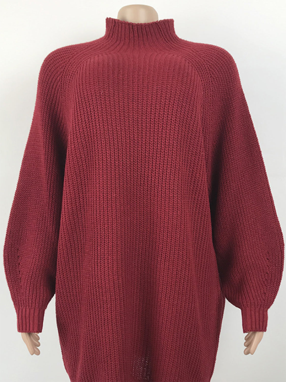 Deep Red ribbed knit cocoon turtleneck dress with balloon sleeves.